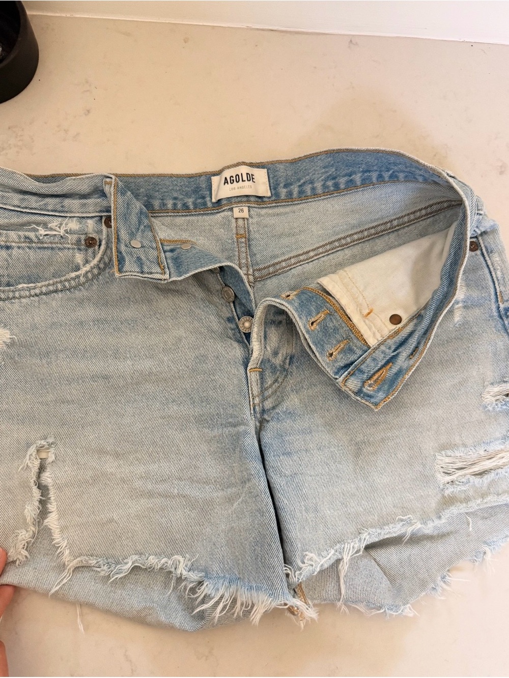Agolde Light Blue Distressed Denim Cutoff Shorts